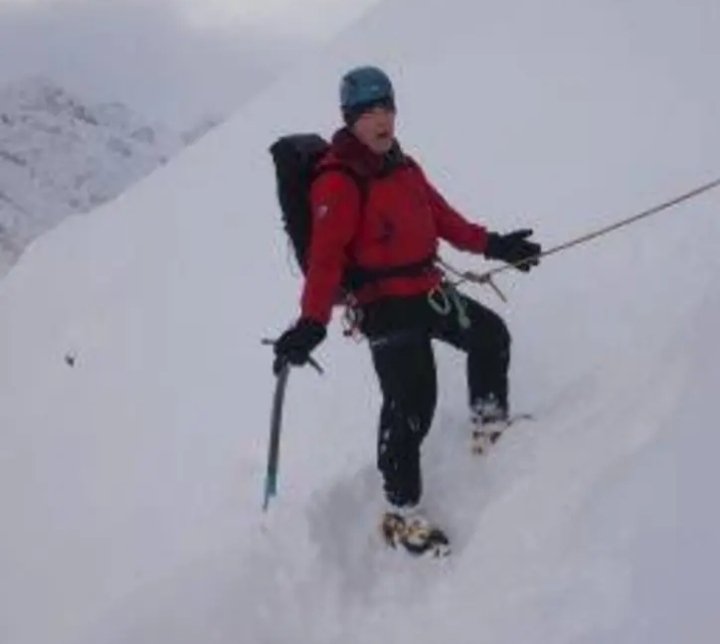 On the end of a rope on a gulley on Ben Nevis. I dare not use the word Mad though lol