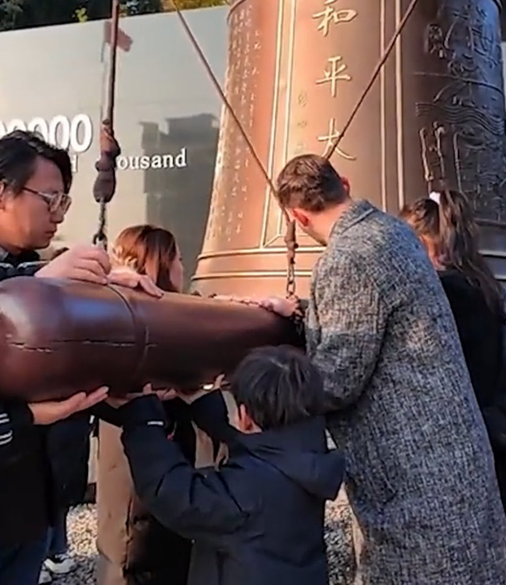 EvanKail's tweet photo. Ringing the sacred bell at the Memorial Hall of the Victims in Nanjing Massacre Saturday. https://t.co/kfdUU9gVEr