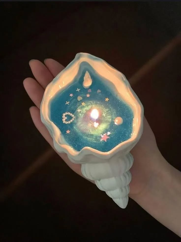 artindetails's tweet photo. seashell magic candle https://t.co/GrqF0TO5kN