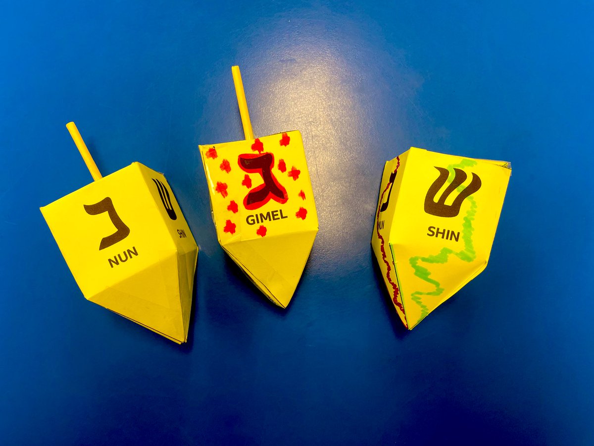 Primary 7 have been learning about the Jewish Festival of Light called Hanukkah which is observed for 8 nights and days beginning on the 25th of December. We learned about the significance of the menorah; what a sufganiya is; and began making dreidels to play 🕯️