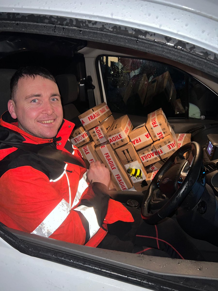 HonigUk's tweet photo. We love our postman Chris! Always Forward thinking and Never Stops Smiling. He ran out of room in the back of the van… So he used the passenger seat! #Busy #Christmas #WorkerBees #RoyalMail #XmasOrders https://t.co/SfxEVvEnth