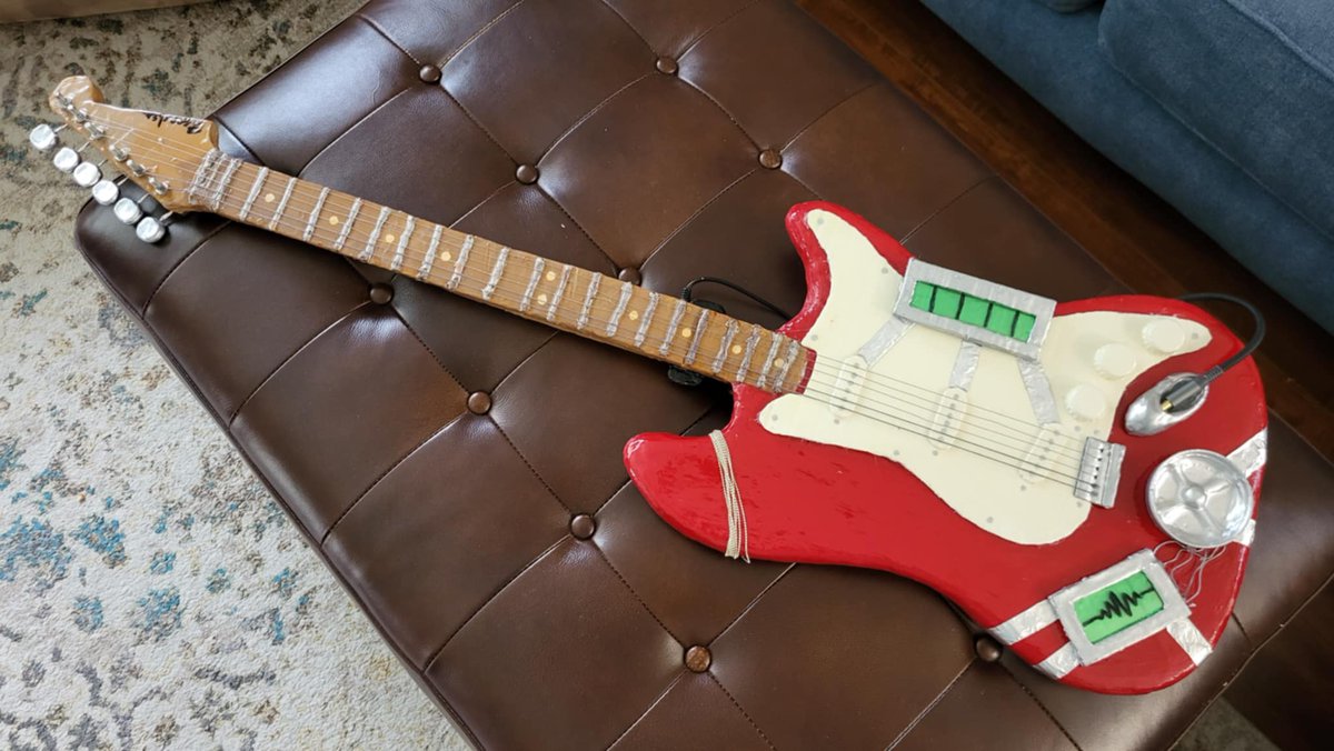 AMRADIO_13's tweet image. After 90+ hours, it's finally done. From cardboard, glue, and a myriad of other junk, I bring you the Sally Face Necro Guitar. This was an absolute dream project for me as I've wanted to make this for 7 years. we had some bumps in the road, but we did it, gang🤘 @PortableMoose