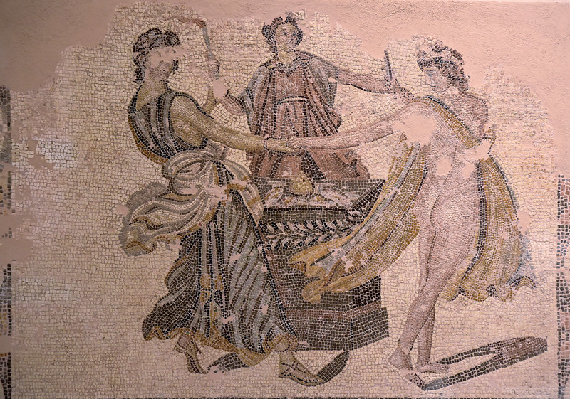 druidtombraider's tweet photo. Roman Mosaic floor depicting the Three Graces dancing around an altar with offerings, from Patras, Greece; courtesy of Carole Raddato. #RomanArchaeology #Archaeology #MosaicMonday @KPW1453 @SaveRome @romanarchaeouk https://t.co/xWm1TqdOxM