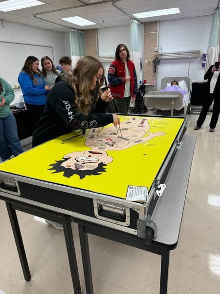 SouthernKYAHEC's tweet photo. Jake was at Lincoln County ATC in Mrs. Mays classes on 11/18 with our operation game! Students played operation while also learning about multiple health careers tied to each game piece. https://t.co/SvekVjnVYZ