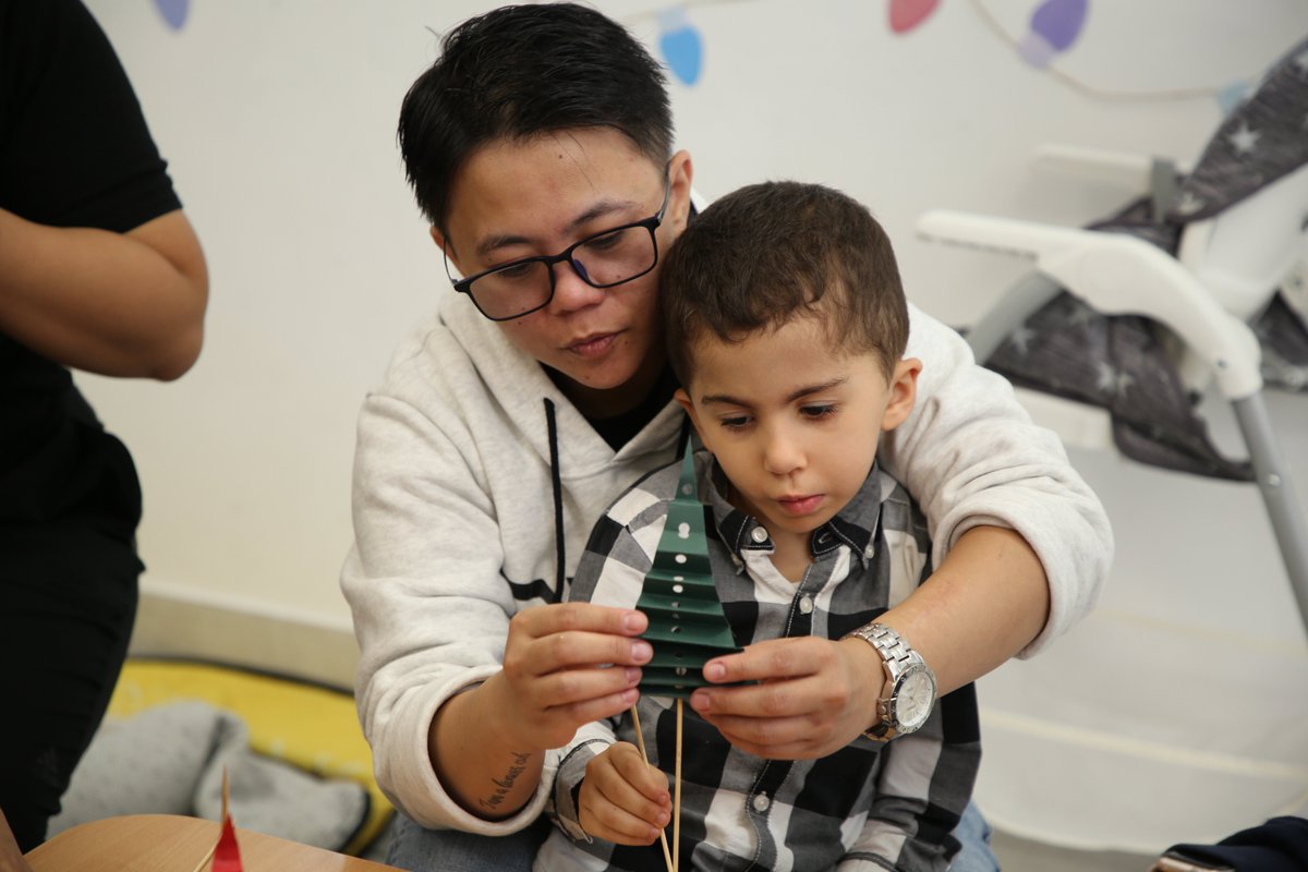 TheHDubai's tweet photo. Spreading joy and inclusivity this festive season! 🎄 The H Dubai team hosted a heartwarming Craft Workshop with the amazing kids at @georgetownuae, creating beautiful festive tree centerpieces. 

#ithappensath #AutismAwareness #FestiveForAll https://t.co/DLn7N3Zra0
