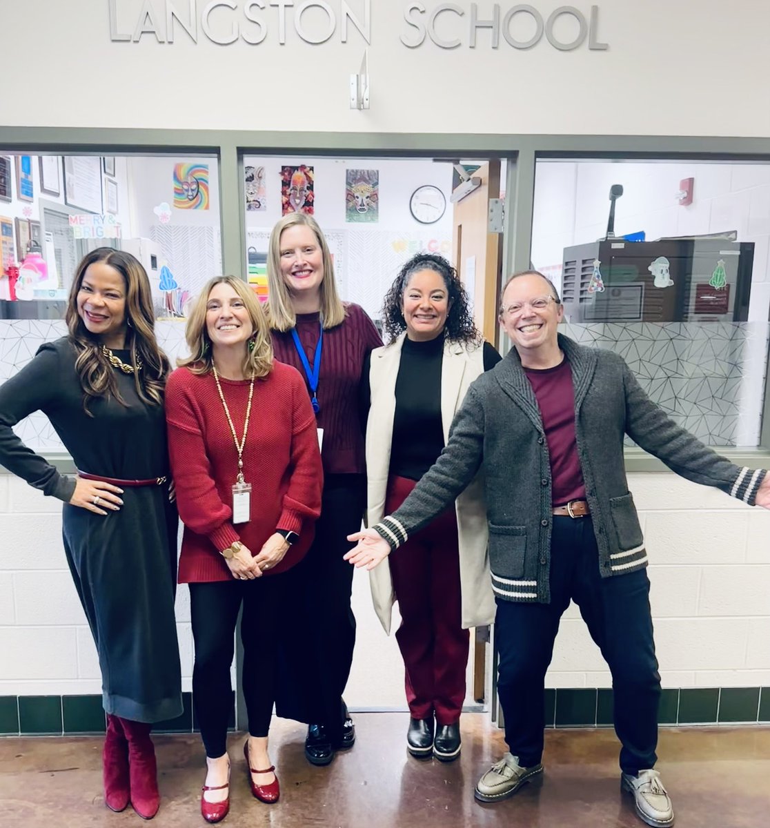 The Langston staff is spreading holiday cheer this Monday, all decked out in our school colors! 💙💛 Let's make this a great week!