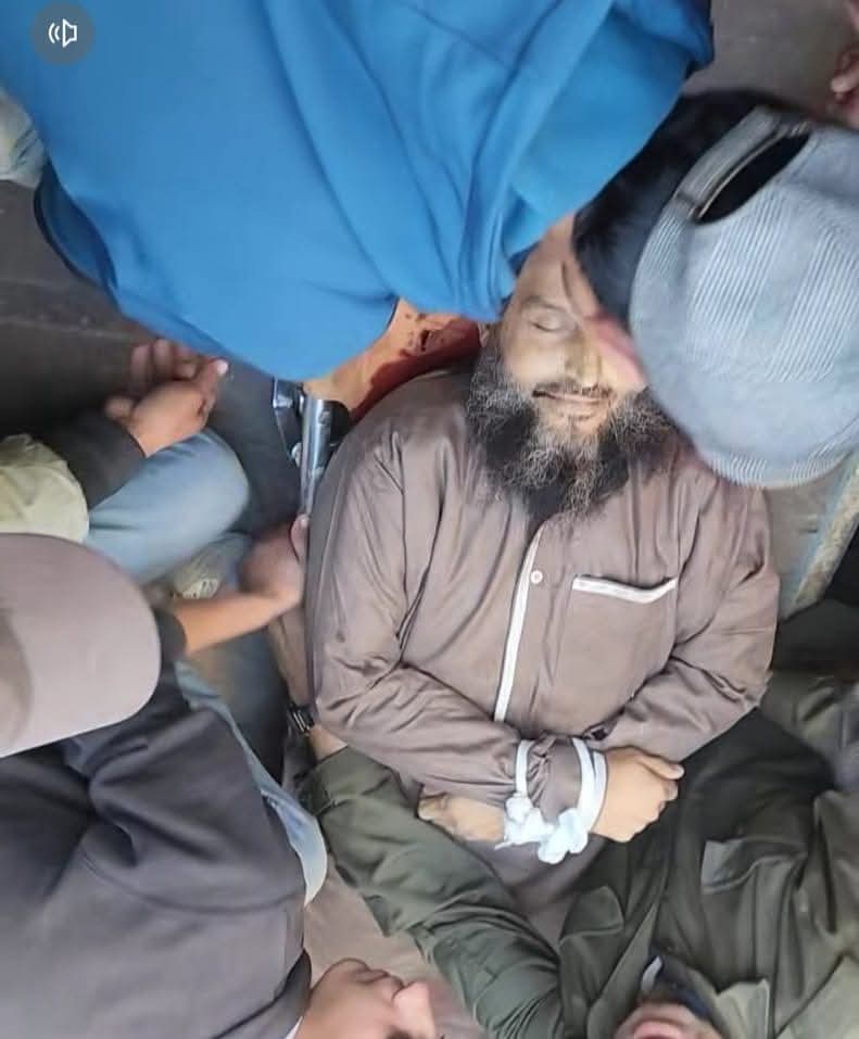 It looks like uncle Khaled is smiling.