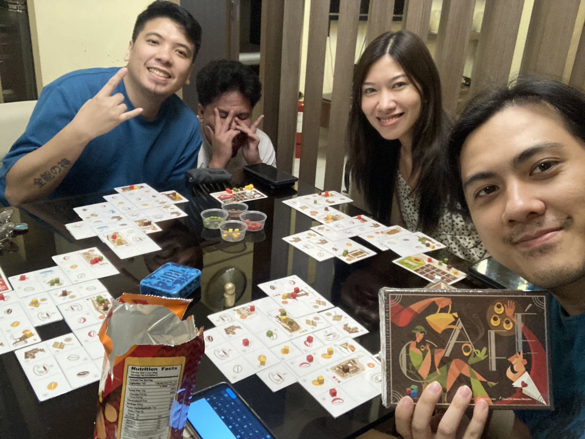 rapunk27's tweet image. The night before our wedding gig, I was able to play boardgames with some of my bandmates. 

“A Midsummer Nights Fayre” is such a cool dice game. Darwin as chaotic as he is, this game fits him well to be the winner. 

We also played Cafe where Edna won coffee shop business.