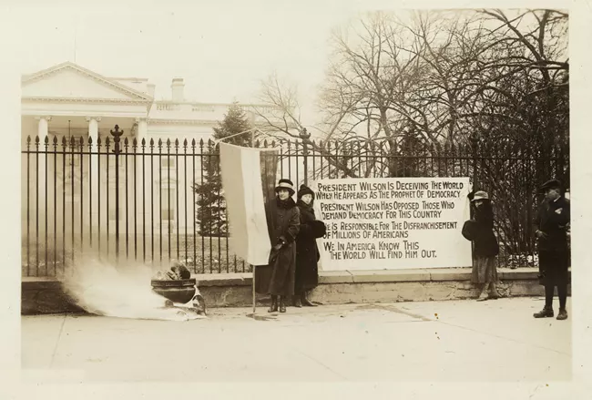 #OTD in 1918, 300 members of the National Woman's Party burned President Woodrow Wilson’s speeches in Lafayette Park &amp; at the White House. Suffragists wrote his own words on slips of paper and set them aflame in protest, demanding action on women’s right to vote. #womeninhistory