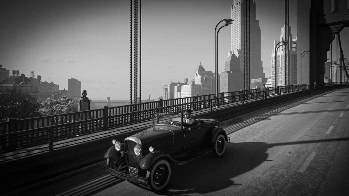 natyzko's tweet photo. "Tommy's behind the wheel, calm but clear-headed. The city's buzzing around him, but he's driving on, ready for what's coming. This is just the calm before the storm."

#mafia #games #firstpass https://t.co/atLtFIF9zD