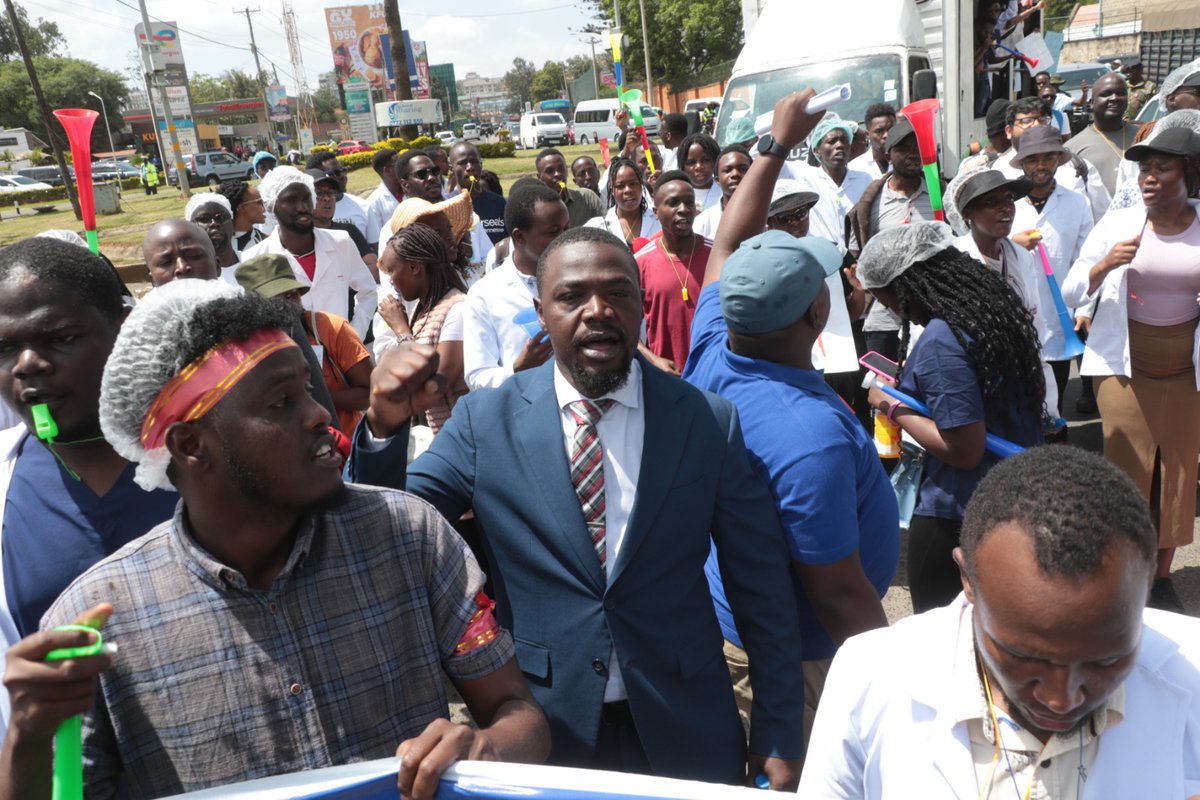 Today, we marched from Kenyatta National Hospital to Nairobi Hospital and the Ministry of Health, delivering a clear message: the time for negotiations is over—we demand action, not words!

Our demands are simple yet urgent: the full implementation of the CBA, immediate and full