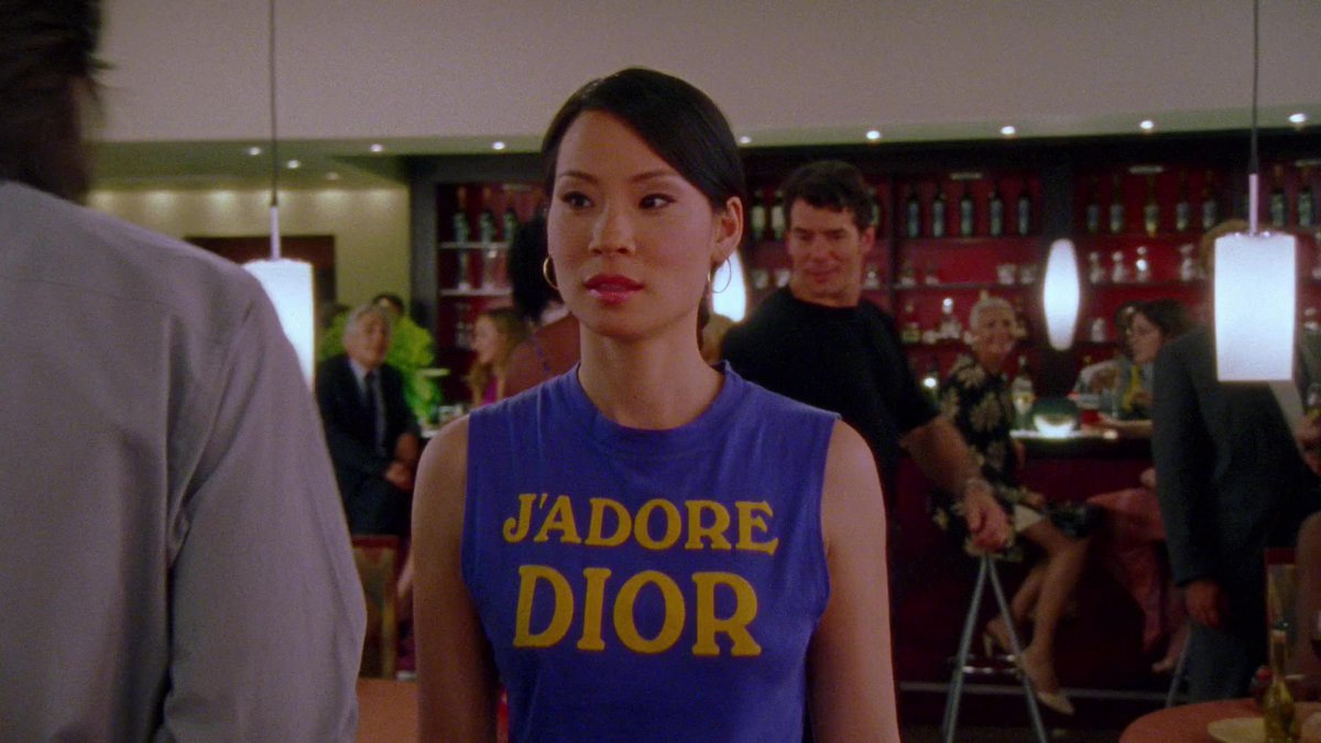 dumbandfunn's tweet photo. Lucy Liu wearing the iconic “J’Adore Dior” tshirt while meeting Samantha for drinks https://t.co/Vy7RgSaqJq