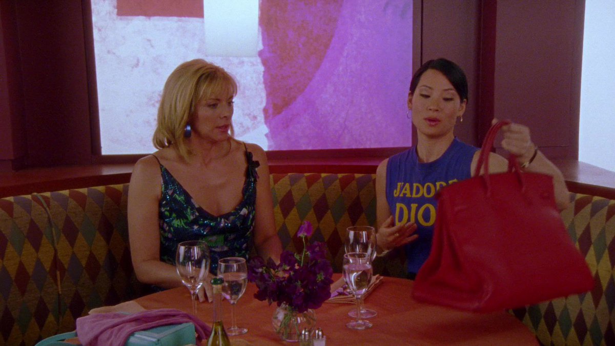 dumbandfunn's tweet photo. Lucy Liu wearing the iconic “J’Adore Dior” tshirt while meeting Samantha for drinks https://t.co/Vy7RgSaqJq