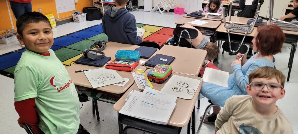 Today Ms. Watson found a few of her ELL students sporting their fabulous Christmas socks. She shared her stripped socks and they got some pics together. Christmas socks are fun!