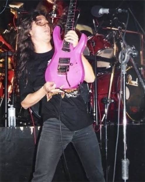 daily_kiko's tweet photo. Kiko with his pink tagima in a random angra show in 1994 #angraband #kikoloureiro https://t.co/0sZtrXTC4C