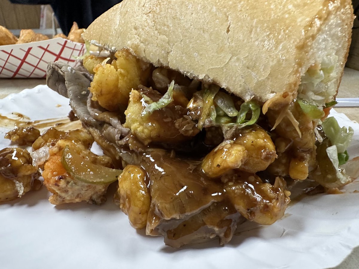 CasualHoya's tweet photo. The Surf & Turf Po-Boy at Domilise’s in NOLA. #documentyourlunch https://t.co/yWJ5nUveI2