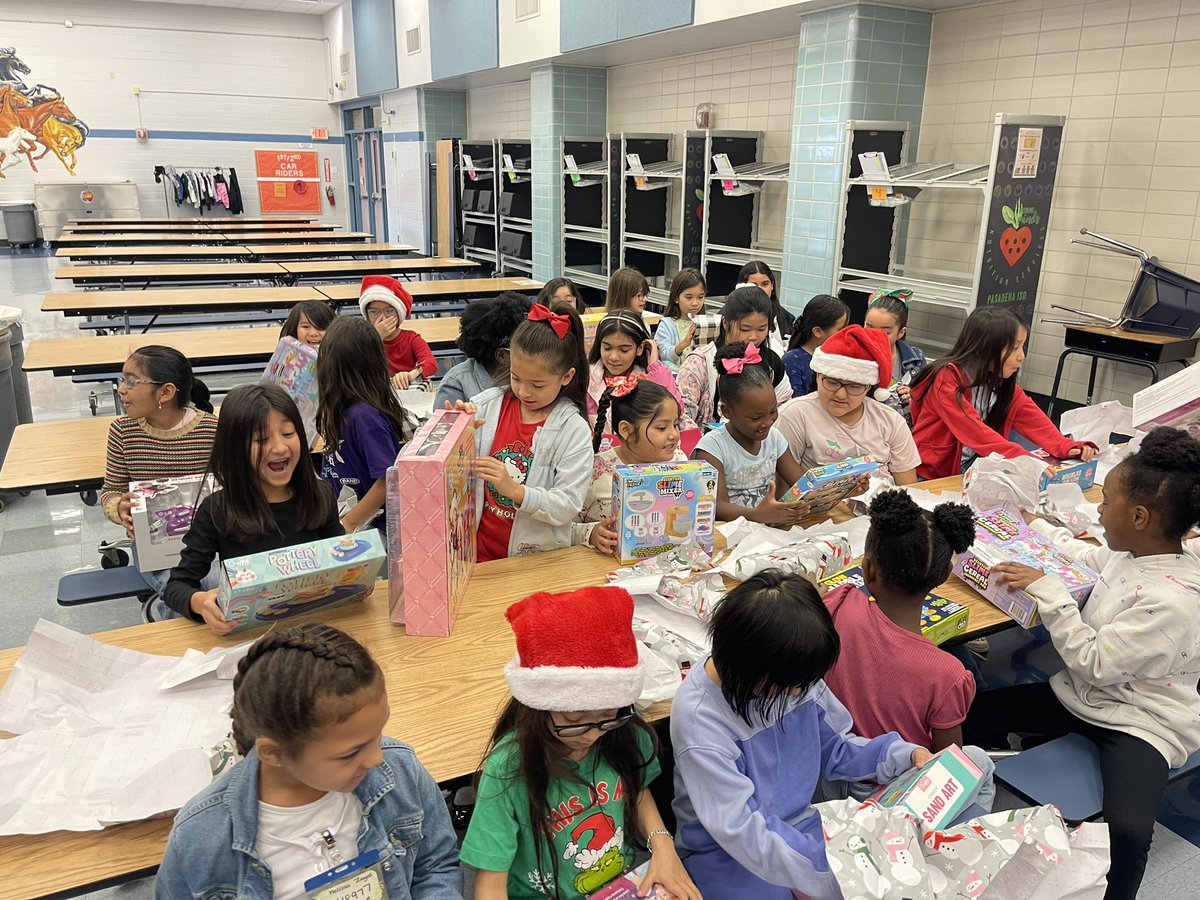 In spirit of giving, <a href="/PasadenaISD_TX/">Pasadena ISD</a> Dobie High school Men of Dobie visited some of their old elementary schools to give gifts to the youth. #mentorship <a href="/houstonpolice/">Houston Police</a> <a href="/MeadorElementa1/">Meador Elementary</a>