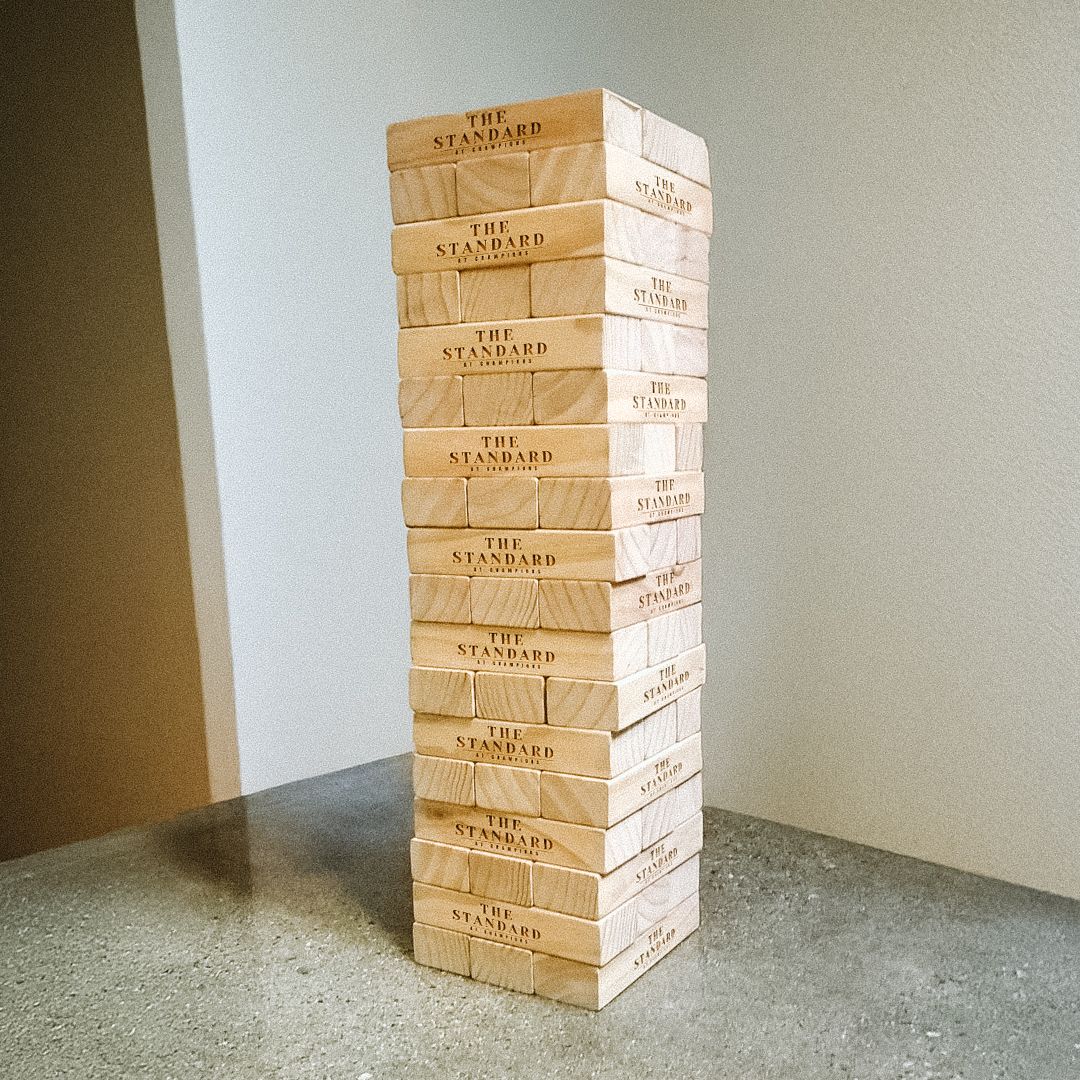 The giant tumbling tower is making a statement at The Standard at Champions. Standing 29 inches tall, it's great for community events or leasing offices. Need a custom set like this for your property? We can make that happen, too.