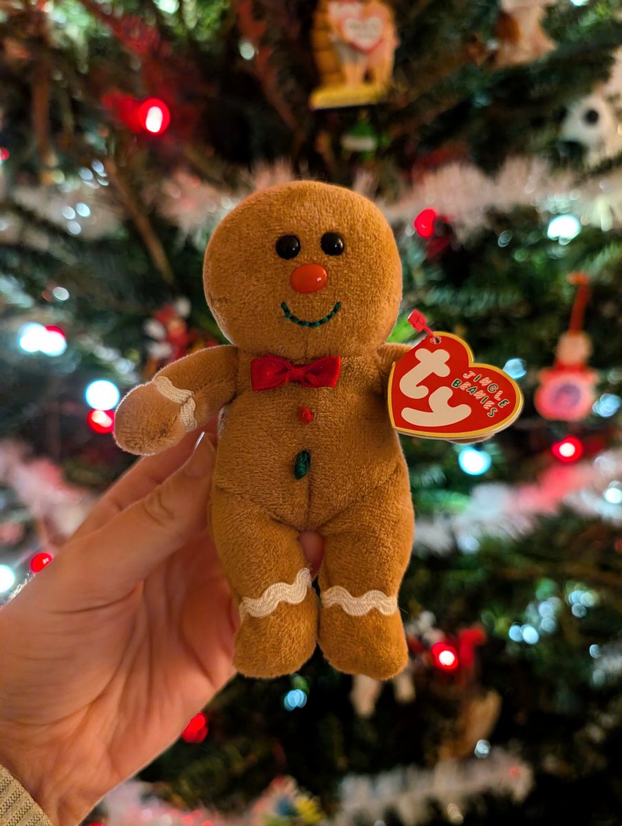 seeing that gingerbread beanie baby all over my timeline is so funny cause this little guy has been on my christmas tree every year since 2007 lol