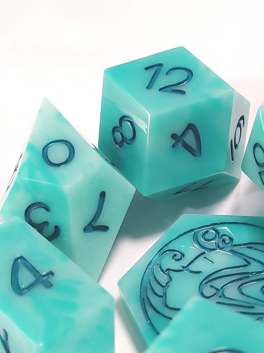 FlutesCreations's tweet photo. Well, it's Monday sigh...... Today is not great, but life goes on. Here is another pretty set of dice. 

Whispy Teal

(Currently working to get the new sets on the website.) https://t.co/rVErBUiXU1
