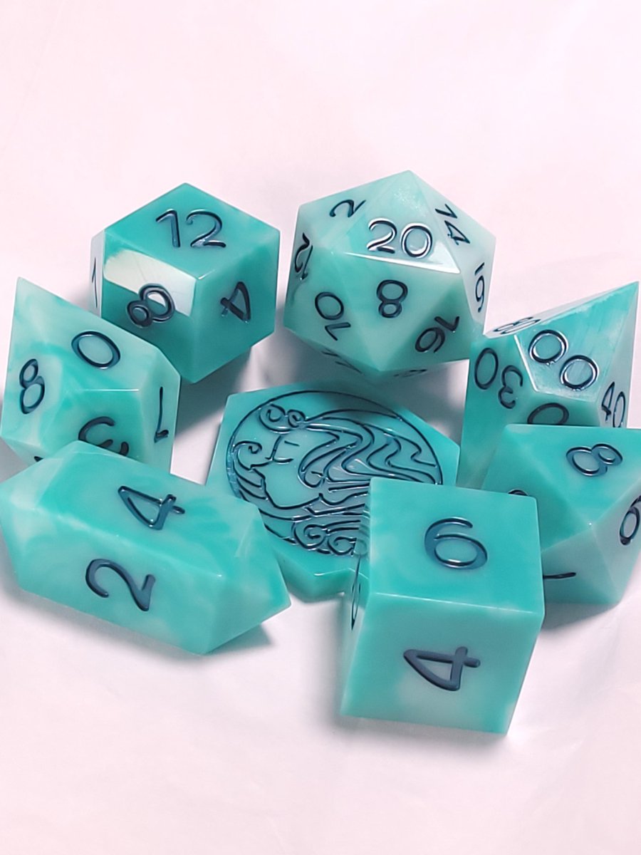 FlutesCreations's tweet photo. Well, it's Monday sigh...... Today is not great, but life goes on. Here is another pretty set of dice. 

Whispy Teal

(Currently working to get the new sets on the website.) https://t.co/rVErBUiXU1