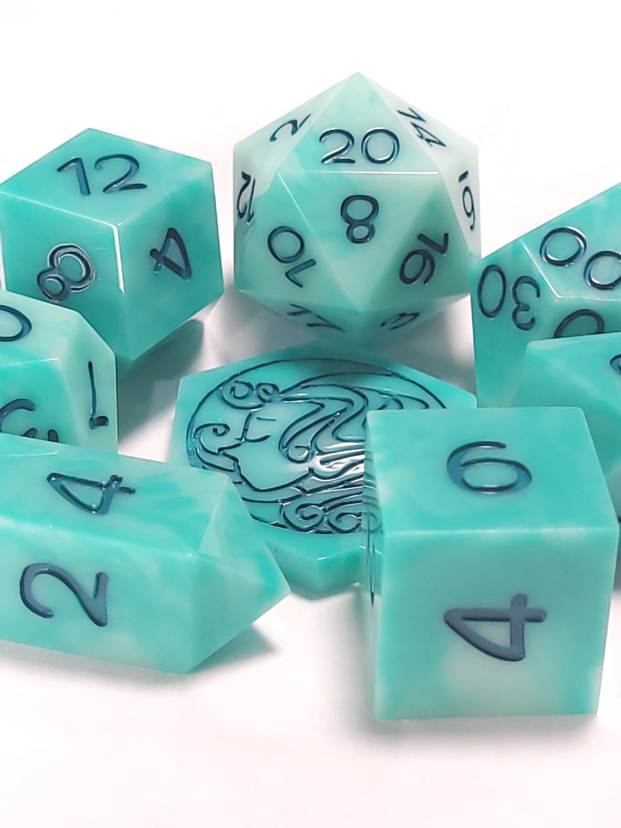 FlutesCreations's tweet photo. Well, it's Monday sigh...... Today is not great, but life goes on. Here is another pretty set of dice. 

Whispy Teal

(Currently working to get the new sets on the website.) https://t.co/rVErBUiXU1