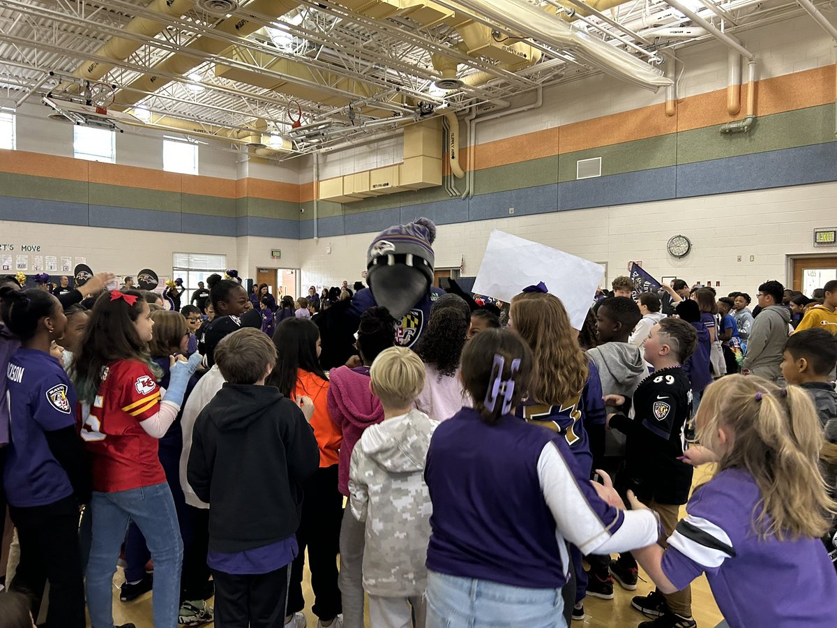 PtPleasantAACPS's tweet photo. What a fantastic way to wrap up the week! Our students were absolutely thrilled to greet the @Ravens cheerleaders, marching band, and Poe. The energy was contagious, and it was the perfect celebration for Purple Friday!Go Ravens! 💜🖤 #BelongGrowSucceed @AACountySchools https://t.co/6Db0I33M7m