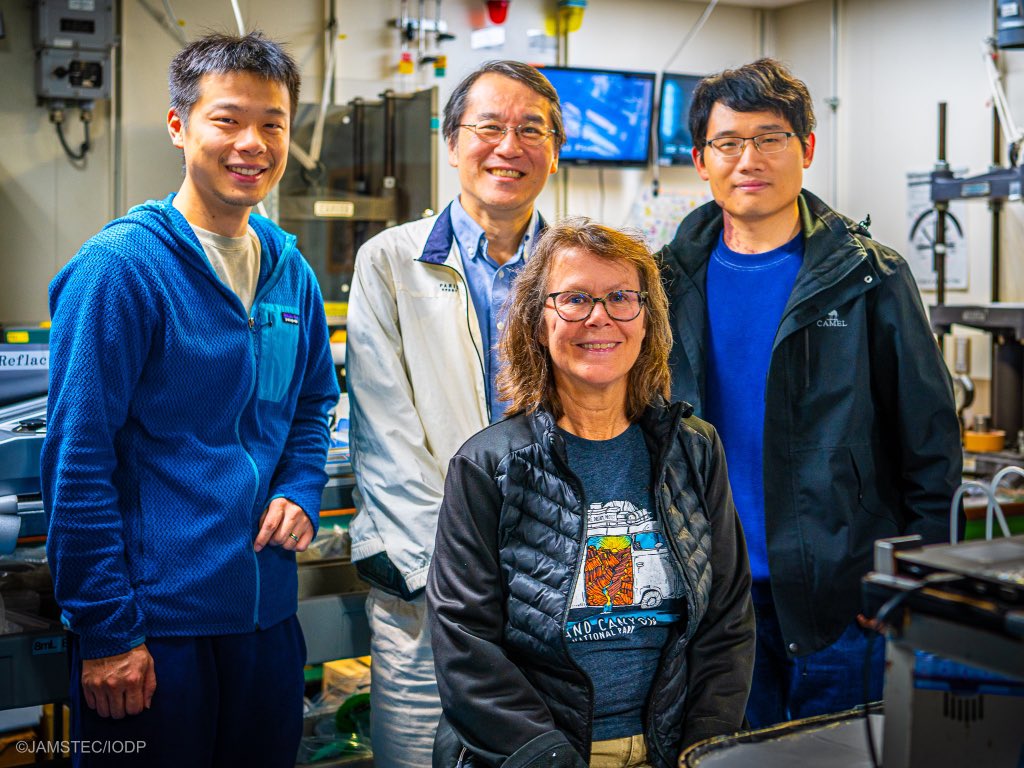 ANZIC_Director's tweet photo. This is the Window 2 geochemistry team on #Chikyu for #IODP #Exp405 #JTRACK. They squeeze the water out of "whole-round" samples from the core and use that water to analyse the chemistry of the pore water. Squeeze-cake anyone? @Chikyu_JAMSTEC @TheJR @anzic_iodp @ECORD_IODP https://t.co/2oZK8je6q4