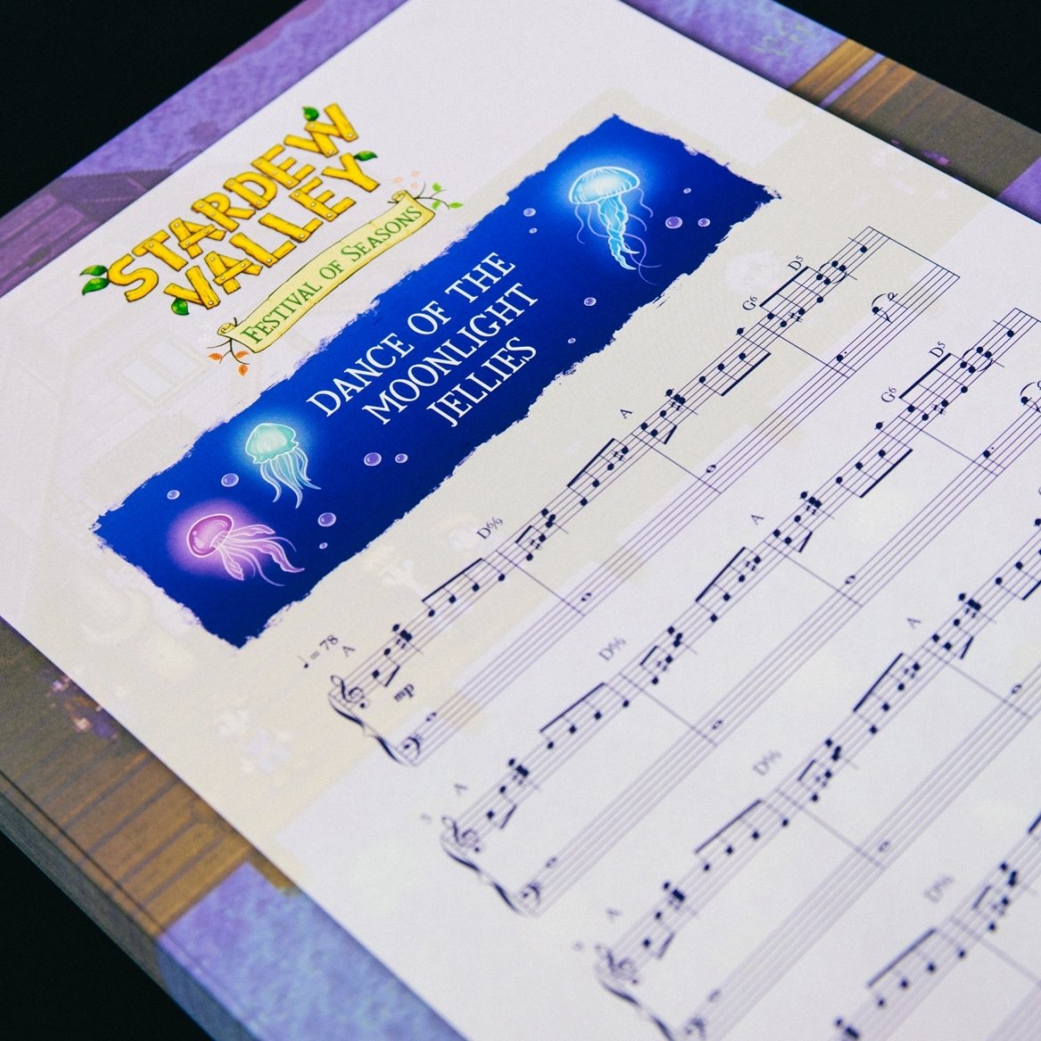 StardewConcert's tweet photo. During the Stardew Valley: Festival of Seasons tour, each attendee received a free music sheet with a Dance of the Moonlight Jellies score.🪼🎼

Which song would you like to see on next year’s music sheet? 

#StardewValley #SymphonyofSeasons https://t.co/fBRpxh7c9w