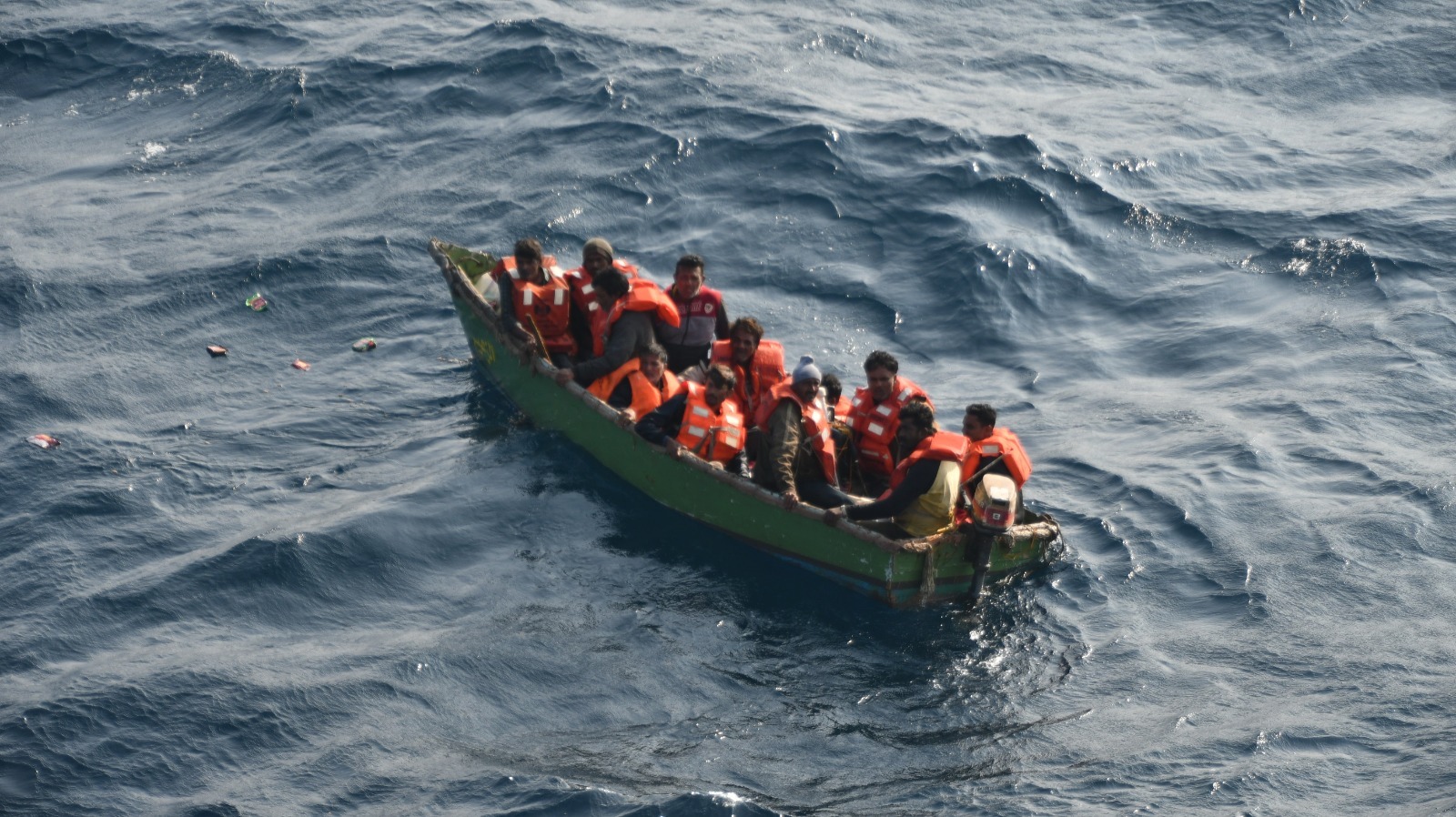 ICG rescues 12 seafarers from sunken dhow in coordinated operation with PMSA