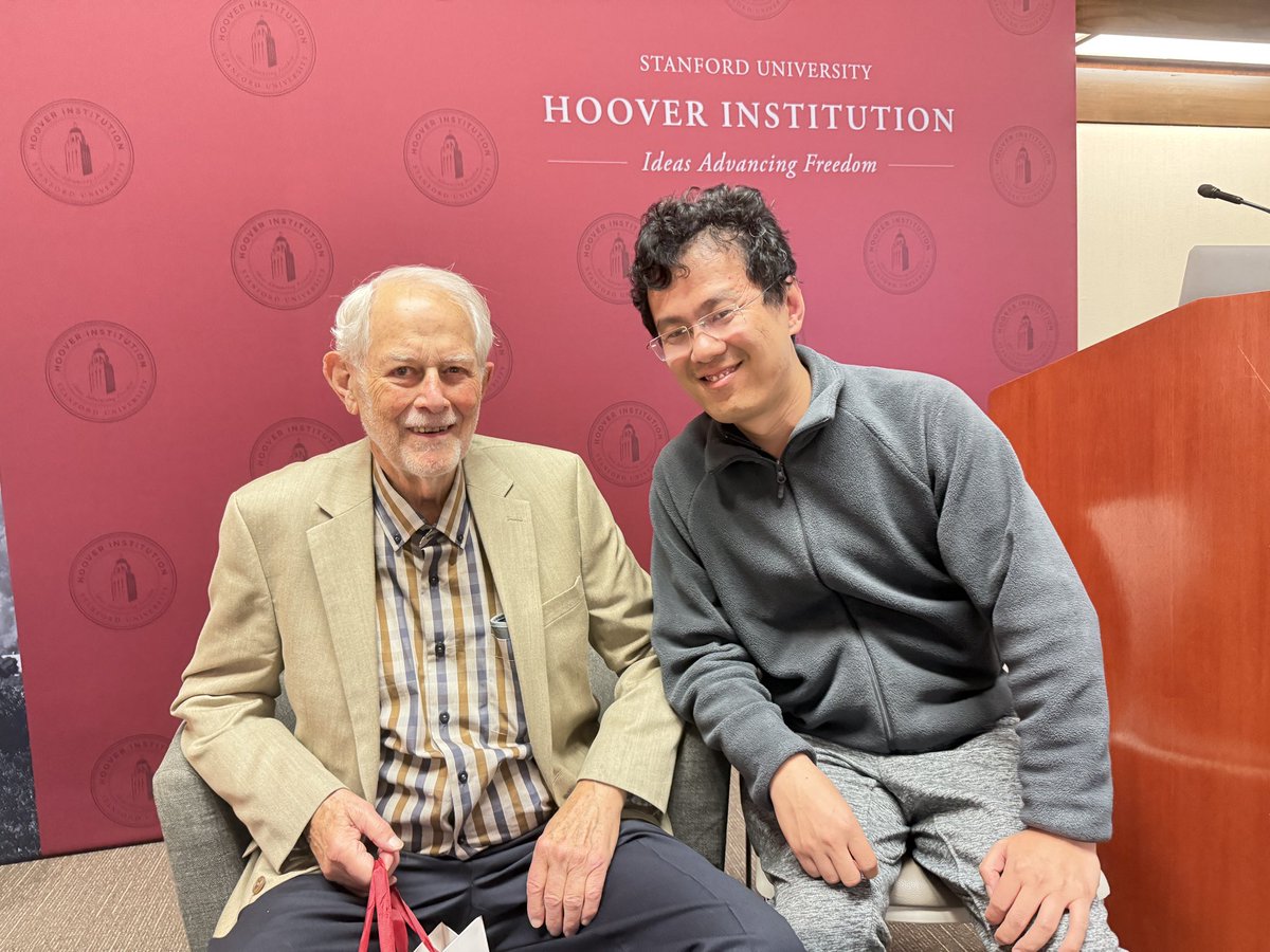 OnicekHe's tweet photo. I’m thrilled to meet my Great Grand Mentor today at Stanford—87-year-old Robert B. Wilson, the 2020 Nobel laureate in Economics for his outstanding contributions to auction mechanism design. My Doctor advisor at the University of Hong Kong, Prof. Li Jin, was a student of Bengt Holmström, the 2016 Nobel laureate in Economics for his work on Contract Theory. This makes Robert B. Wilson the “mentor of the mentor of my mentor.”
I paid my respects to him, and his insights were truly inspiring. I sincerely wish him good health and hope that future generations of students will also have the opportunity to hear his wisdom at Stanford.