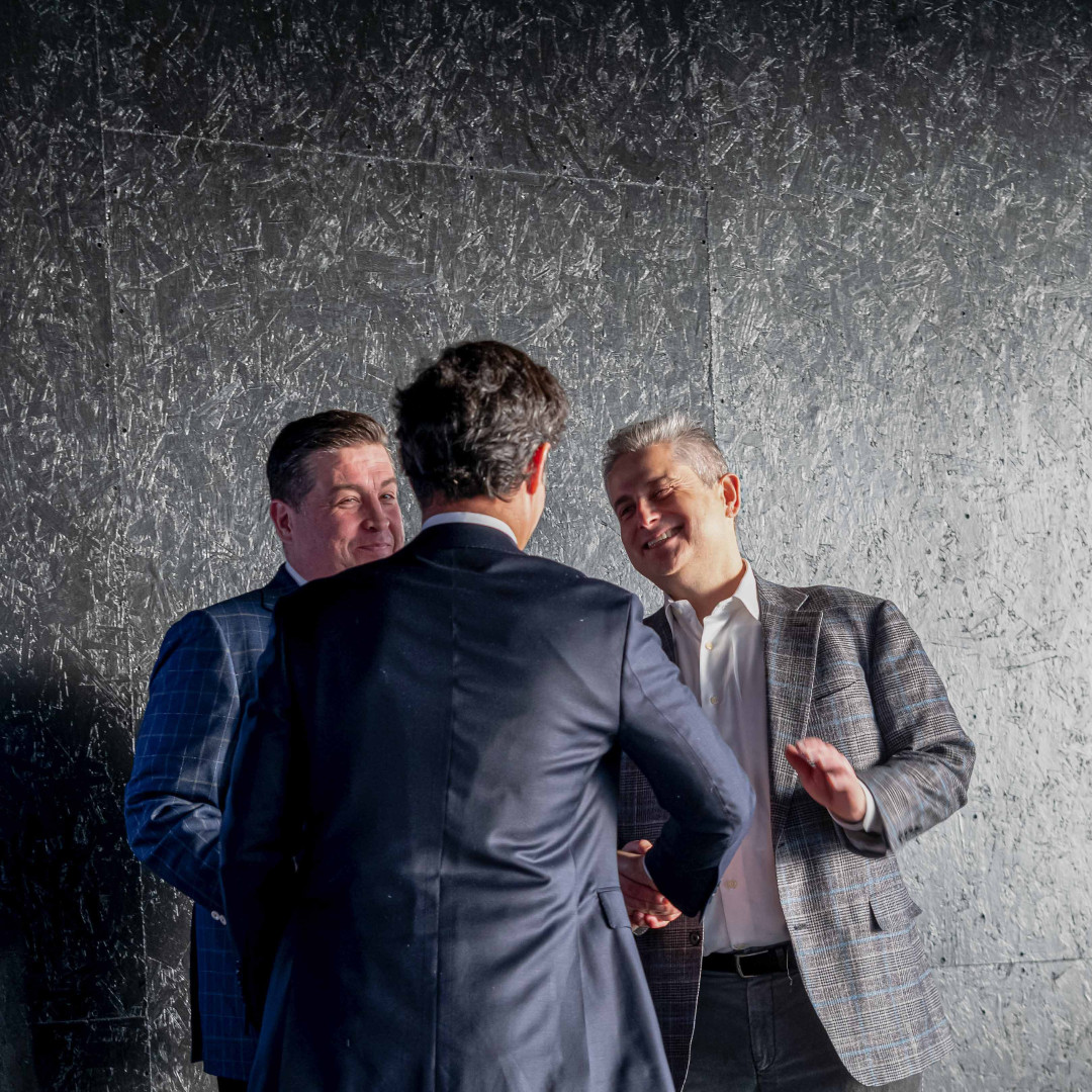 Natural light, textured background, shiny suits, big smiles. Perfect combo for a great networking event photo #networking #forum #HappySmile #TexturedBackground #NaturalLight #ShinySuits #NetworkingEvent #EventPhotography #ForumDiscussion