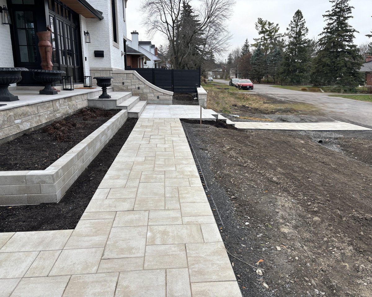 RNDConstruction's tweet photo. Faircrest Manor: The hardscaping for this stunning home was complete 🏡✨—just in time before the snowfall!

#FaircrestManor #Hardscaping #Landscaping #NetZero #GreenBuilder #SustainableHomes #OttawaHomes #EcoFriendlyDesign #sustainabilitywithstyle #NetZero #architecture https://t.co/e5ouNSS5Rg