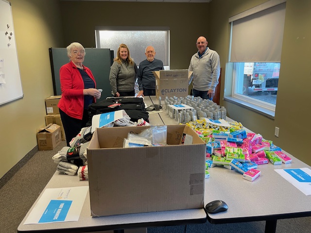 GSRotary's tweet photo. Yet another community service project for the holiday season!  Thanks to @HPSTransformers for inviting us to participate in their "Kits For A Cause" event, packing 120 gift bags with essentials for Royal City Mission. https://t.co/6wRarlz7WH