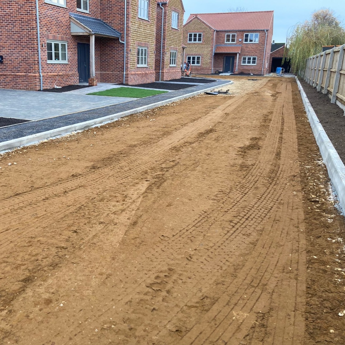 WNSurfacing's tweet photo. Exciting progress on our latest housing development project! The subbase is expertly graded and prepped, setting the stage for the next step—laying down a smooth layer of asphalt. https://t.co/M26C4DwUeA