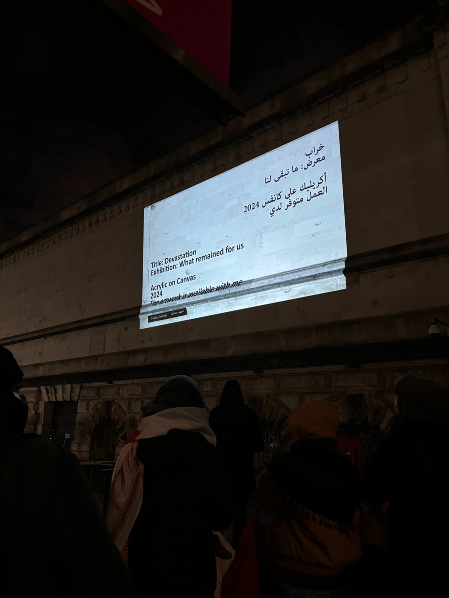 Palestine protesters display the #GazaBiennale exhibition, projected on the outer walls of Tate Britain