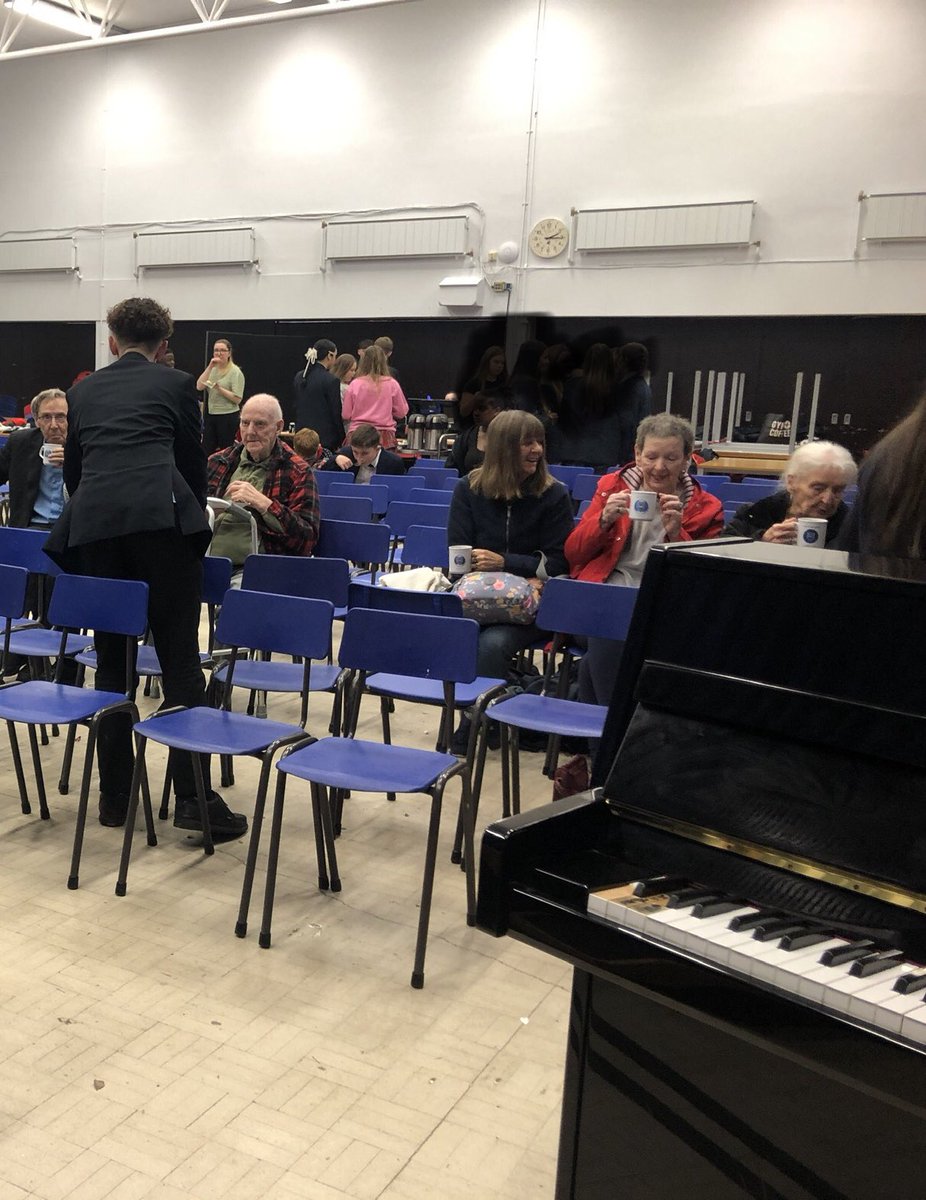 It’s time for tea and cake during the talent show interval. All served and prepared by our brilliant Year 10 students. Our guests from the local community are having a great time. They are really impressed by the fantastic performances!