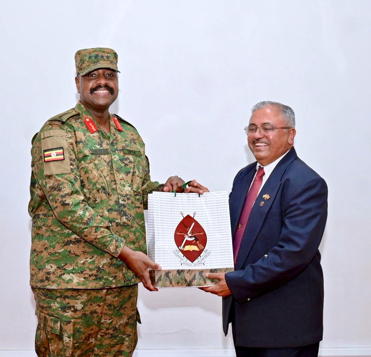 NFSU_Official's tweet photo. In a high-level meeting held at Kampala with the Chief of Defence Forces, Gen Muhoozi Kainerugaba and High Commissioner of India, H.E. Mr. Upender Singh Rawat, NFSU's Uganda Campus Director, Air Commodore K.R. Thaakar, apprised about NFSU, its Uganda Campus, and the way forward. https://t.co/wGXhSktAwA