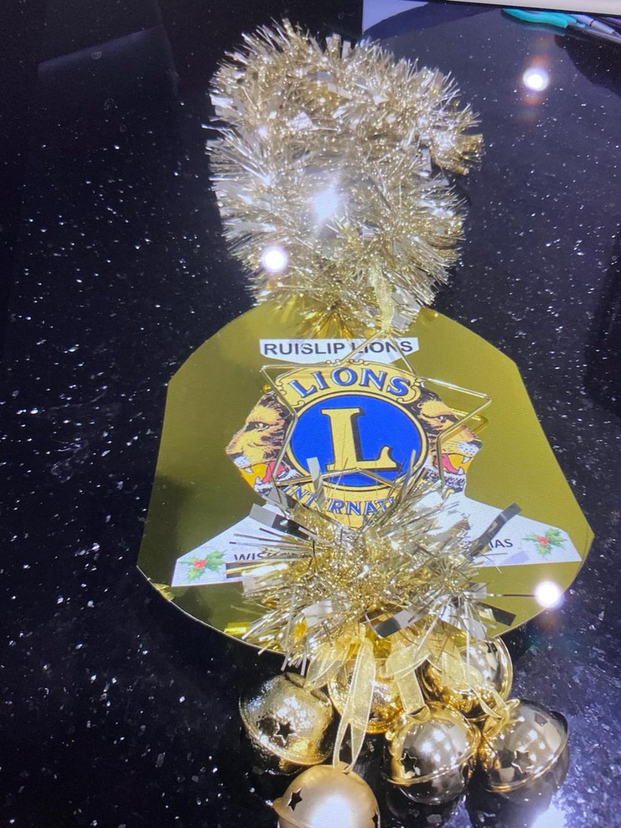 Hanging Ruislip Lions Bauble at Eastcote House and Garden Community Event.