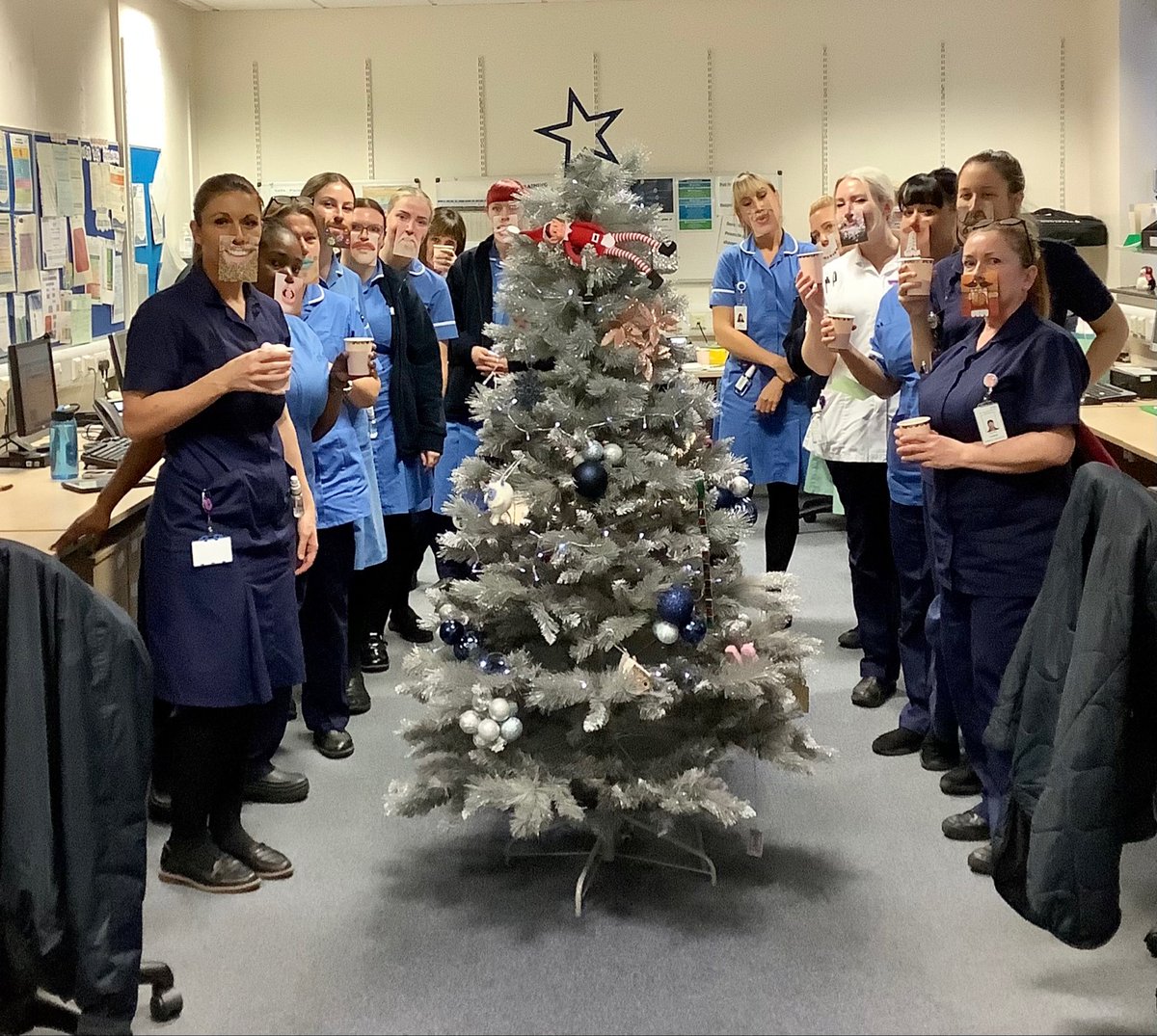 RachelS75378219's tweet photo. In the run up to Xmas a little morale boost is needed - at #burnleyeastDNs we have taken the time for #weeklywellbeing with hot chocolate with cream and marshmallows and festive faces ☕️🎄 https://t.co/MglC3NAMN3