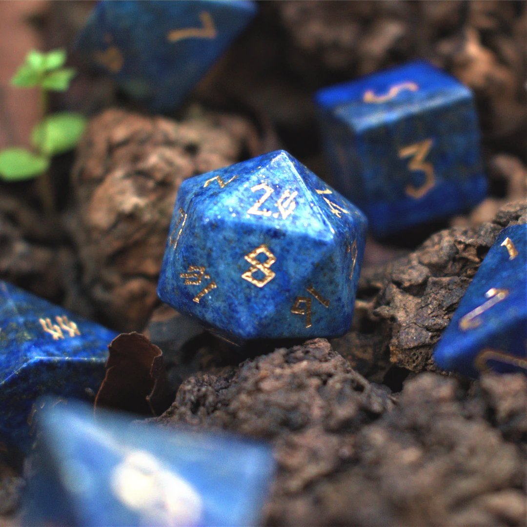 MistyMtnGaming's tweet photo. Embrace the deep, cosmic blue of our Lapis Lazuli dice set. Perfect for those who seek both power and beauty in their game. 🌟🎲
https://t.co/qp87WzReFU
#ShinyMathRocks #TabletopTreasures #RollWithUs #GeekyGifts #RolePlayingGames https://t.co/xrErCCjC11