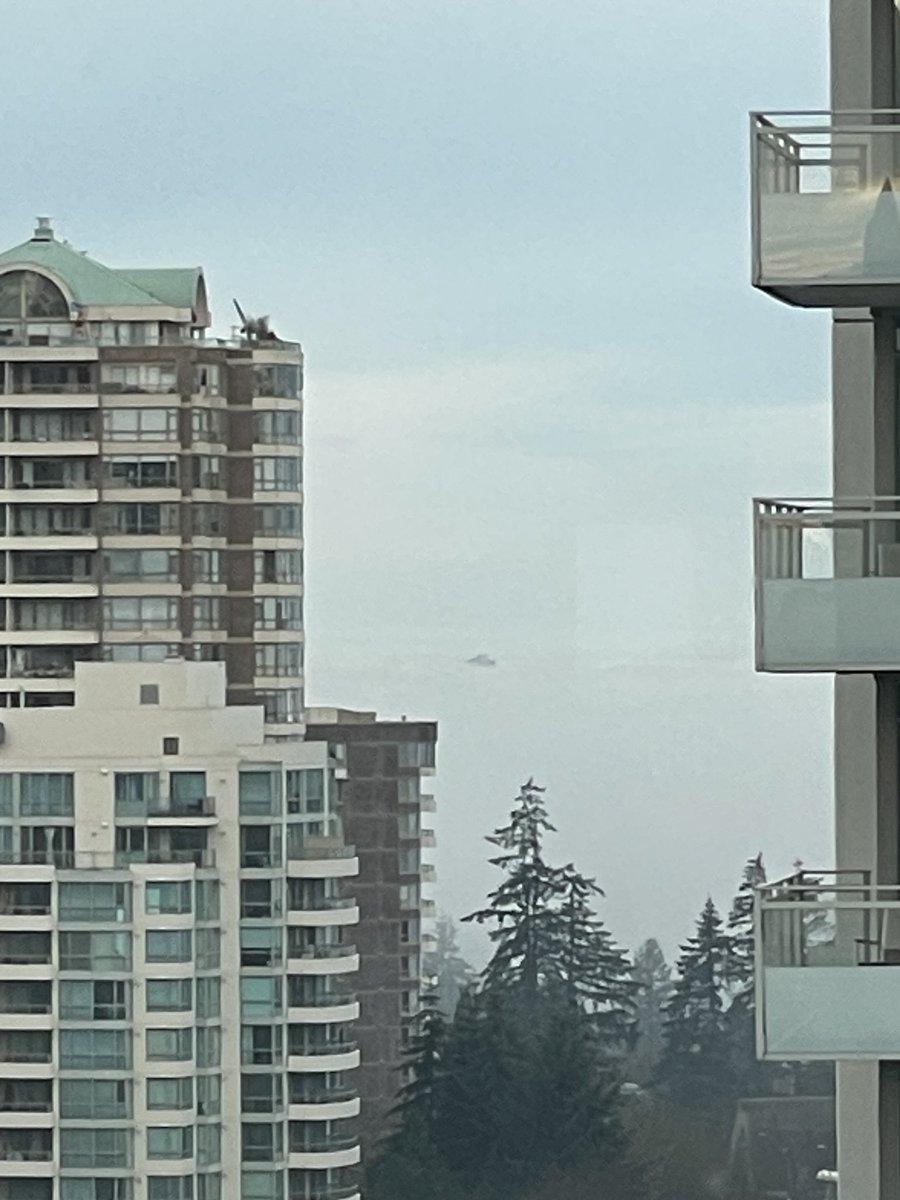 jimmybee604's tweet photo. Just the top floors of the new  tower at Granville and Broadway showing today above todays fog.  As seen from Metrotown. https://t.co/GJVy3n703N