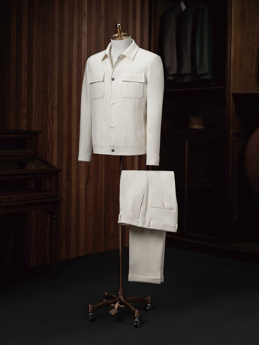 POLLHEIM_au's tweet photo. Elevate your wardrobe with the effortless sophistication of this ivory field jacket. Its clean lines and minimalist design redefine smart-casual elegance, offering a perfect blend of refinement and modernity. The sharp pocket detailing and streamlined silhouette create a tailored look that transitions seamlessly between relaxed outings and semi-formal events. Paired with matching tailored trousers, this ensemble is a harmonious masterpiece, exuding comfort and style. Whether you’re heading to a weekend gathering or an evening affair, this outfit promises to keep you looking polished and contemporary.

#Pollheim #fashion #style #clothing #handmade #tailoring