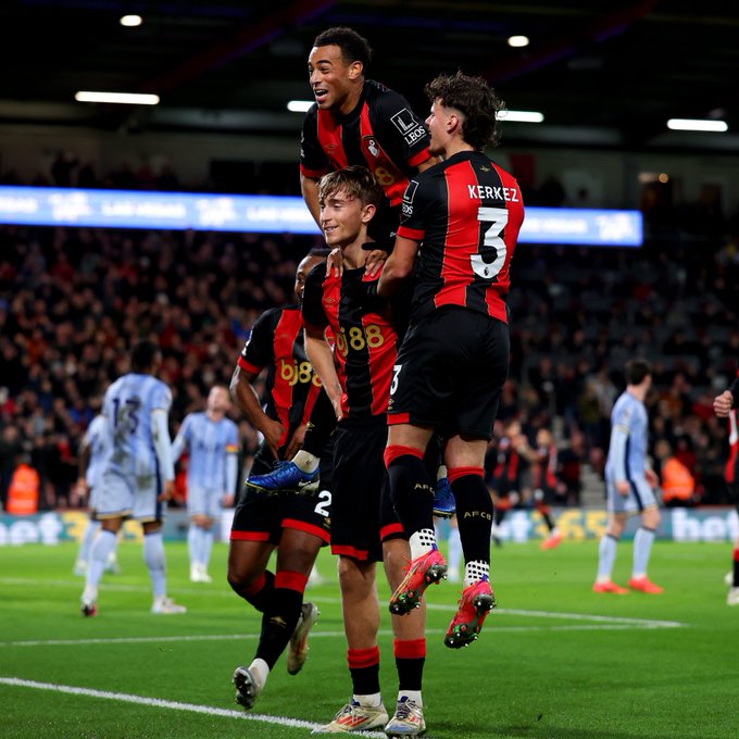 Milos Kerkez and Tyler Adams jump on Dean Huijsen after he scored his first Premier League goal.