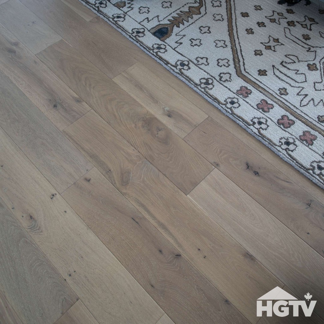 Thrilled to see our flooring featured on HGTV's Farmhouse Facelift 🏡✨ This stunning kitchen showcases the contrast of dark floors and bright cabinets. The natural beauty and timeless charm of our floors brings character to every step. Perfect for modern farmhouse style!