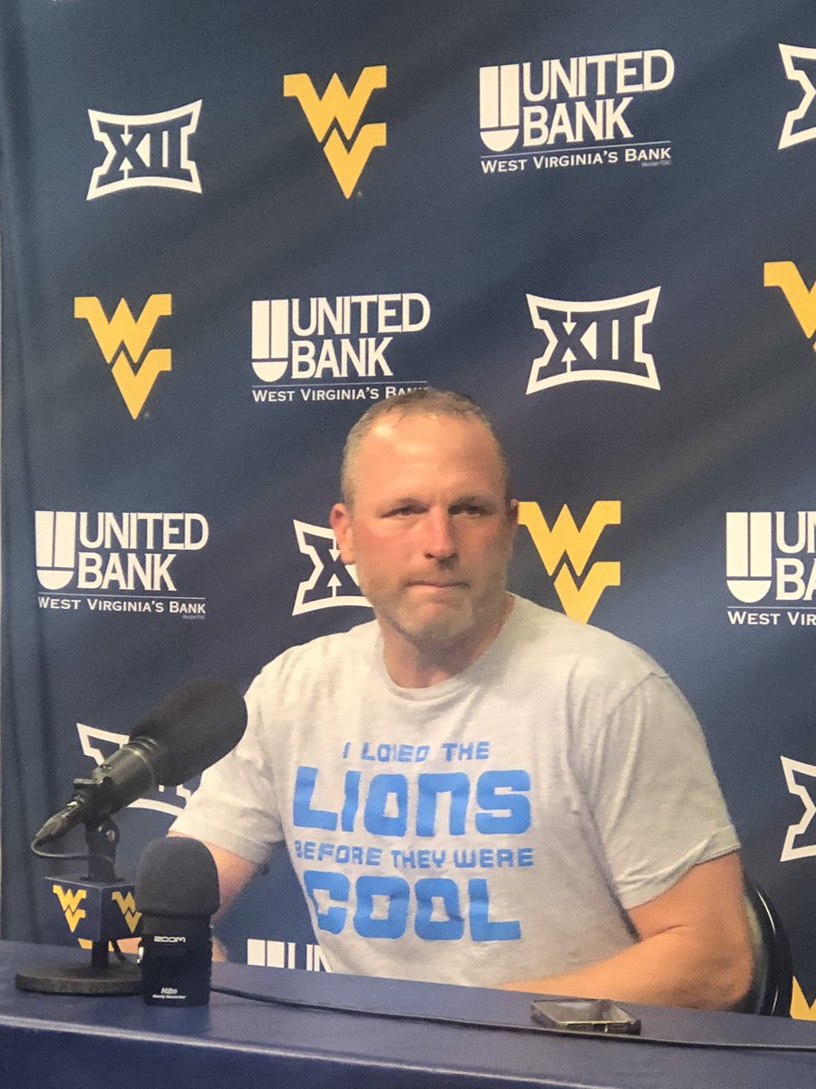 gcarey938's tweet photo. Darian DeVries meets with the media ahead of West Virginia welcoming Georgetown on Friday.

The first-year WVU head coach appears to be looking forward to Thursday night football as well. https://t.co/hSjoThU7Zk