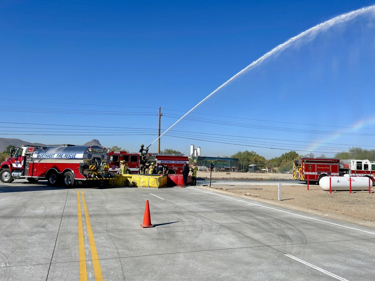 NorthwestFire's tweet photo. Northwest Fire District crew members from Station 333 and Tucson Fire Department crew members from Station 8 joined forces today to #drill on water tender operations. It’s a great day for training and teamwork with our #autoaid partners @TucsonFireDept! https://t.co/KWiPPUnFCc
