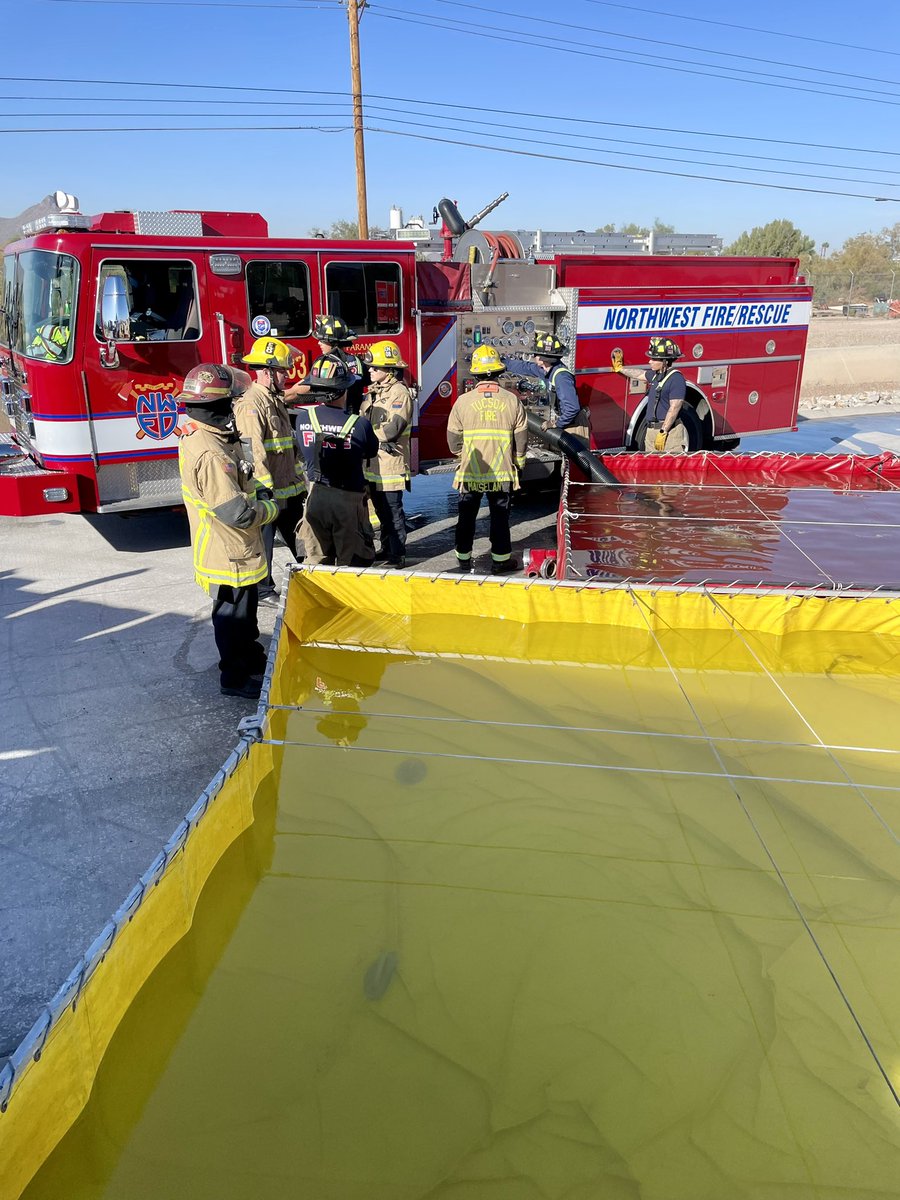 NorthwestFire's tweet photo. Northwest Fire District crew members from Station 333 and Tucson Fire Department crew members from Station 8 joined forces today to #drill on water tender operations. It’s a great day for training and teamwork with our #autoaid partners @TucsonFireDept! https://t.co/KWiPPUnFCc