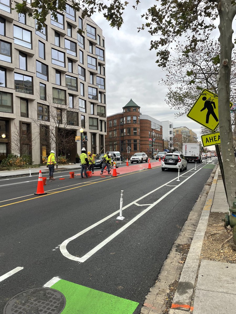 In much of the world, the color red represents leftist political ideology. Particularly those favoring collective control of resources over autocratic rule

In Adams Morgan, it's also the color of a brand new bus lane ❤️🚌
