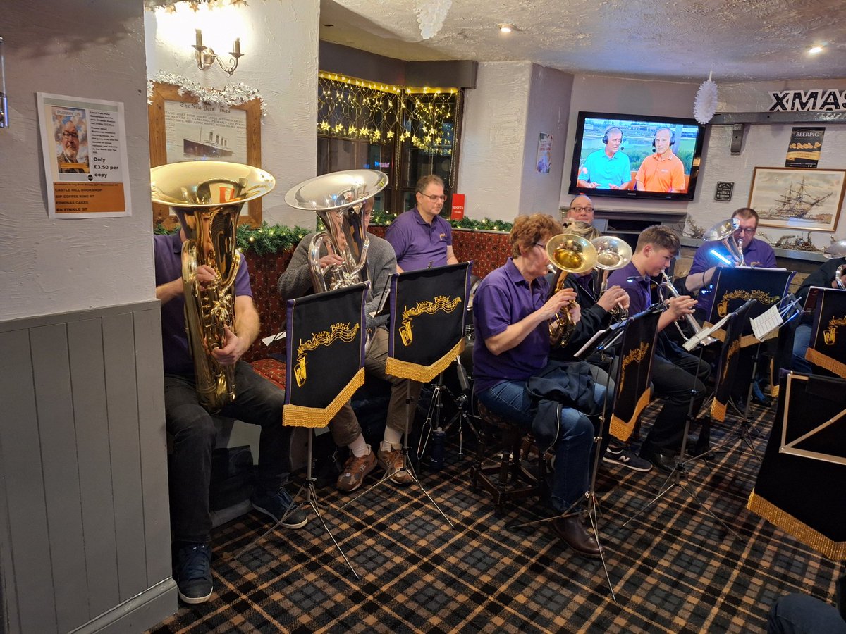 Sarannah68's tweet photo. @LeyburnBand playing at The Ship Inn at Richmond,  North Yorkshire.  Raising money for the @YorkshireAirAmb 
#MerryChristmas #brassband #JingleBells https://t.co/j4RzTbds89
